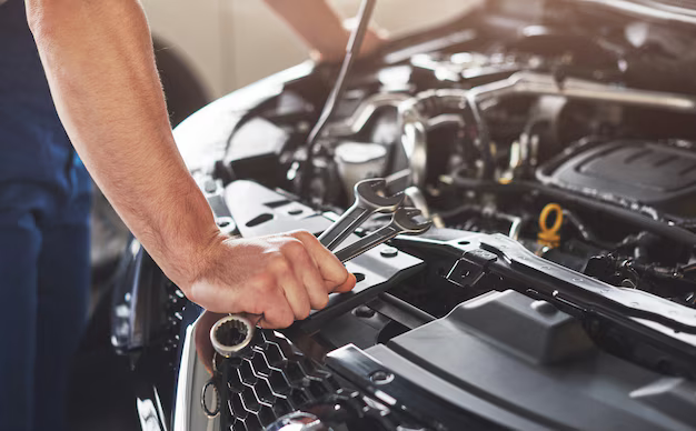 muscular car service worker repairing vehicle 146671 19605